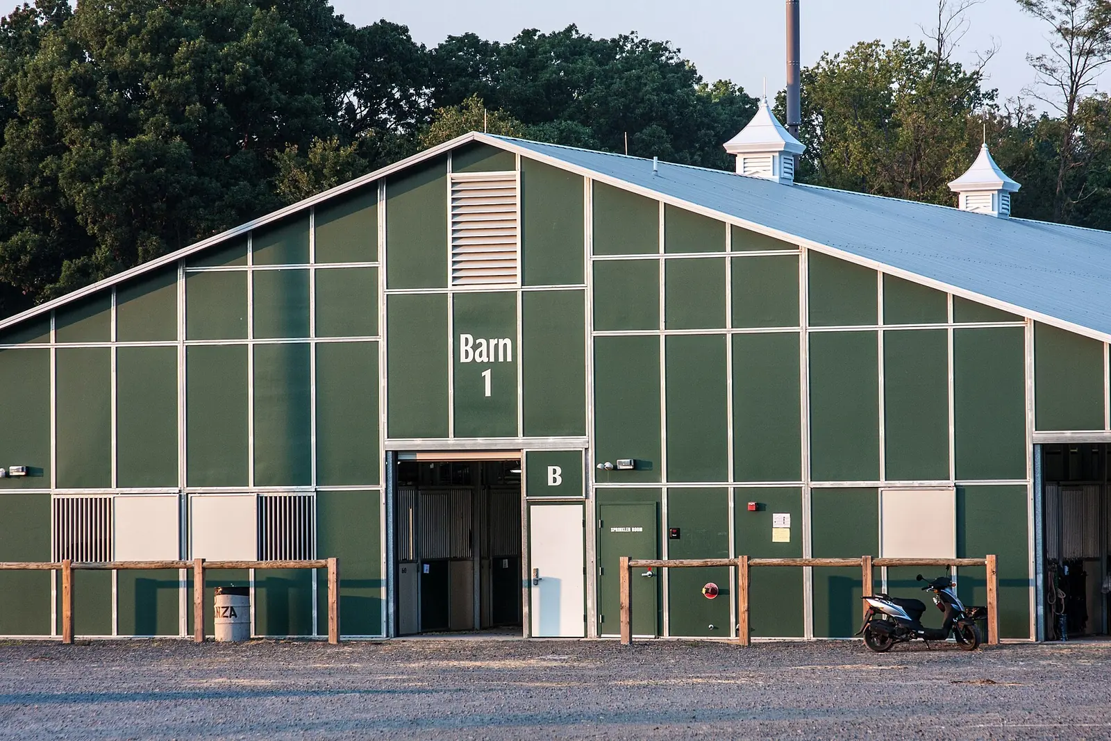 The green equestrian barn and stables at Frying Pan Farm Park, just west of Reston