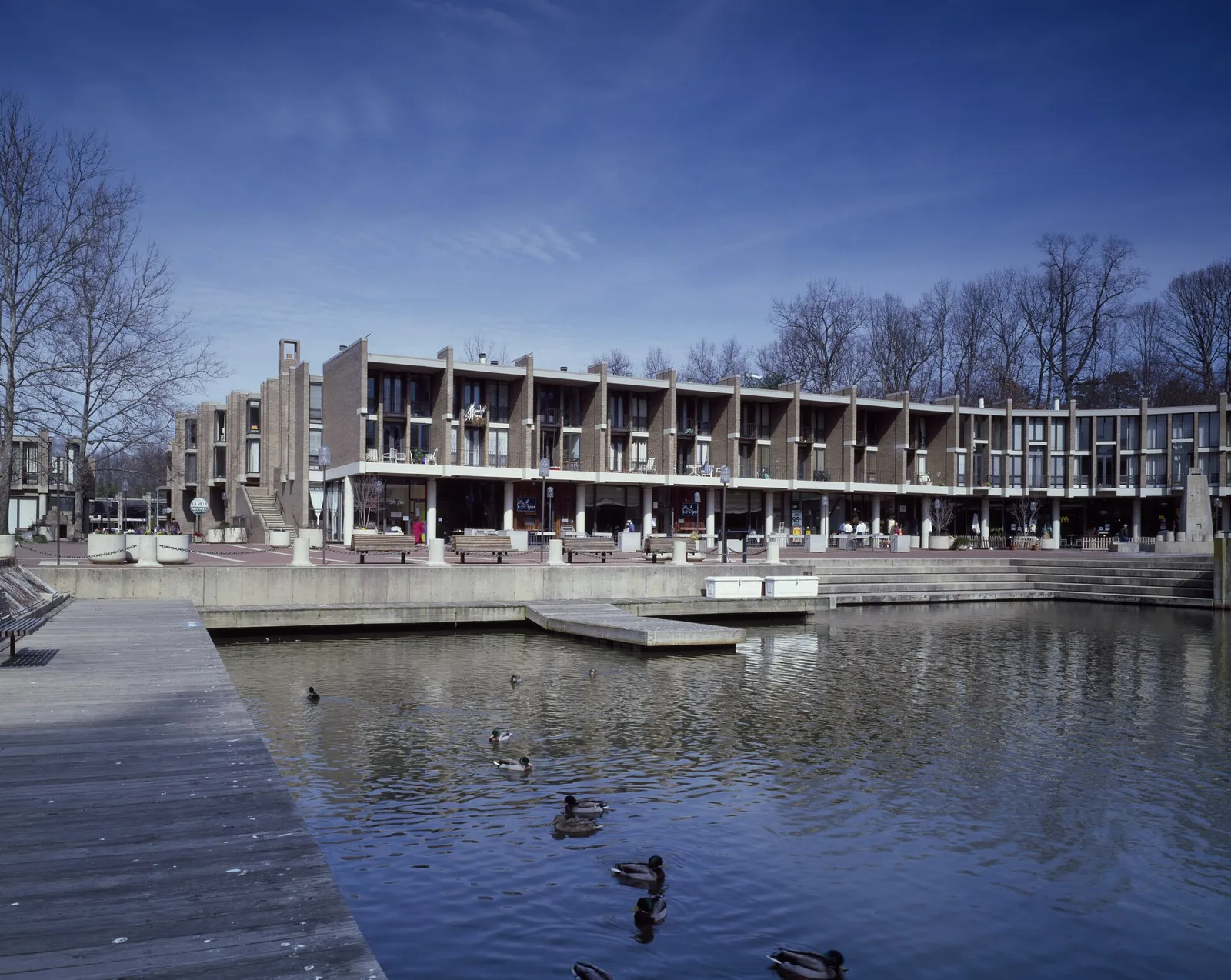 The waterfront plaza and apartments of Lake Anne Village Center, Reston's first village center