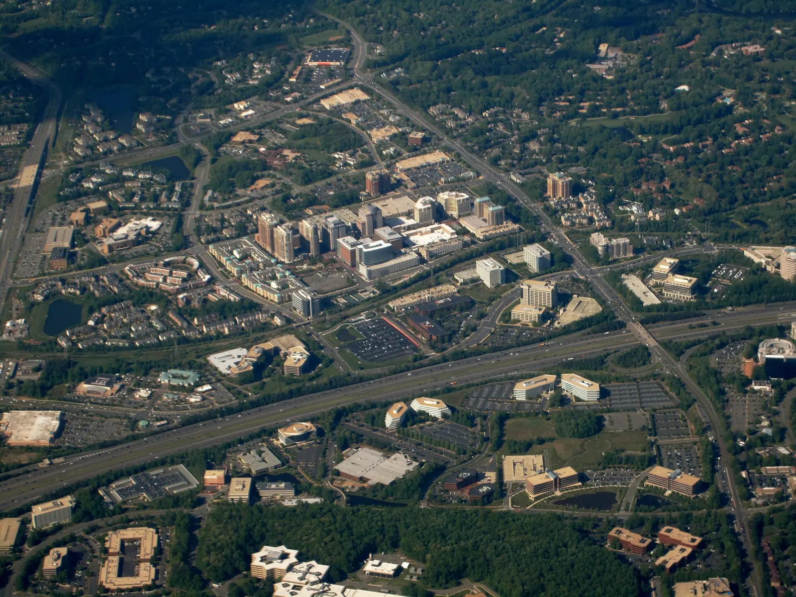 An aerial view of Reston Town Center's office towers and the Dulles Toll Road corridor in Reston