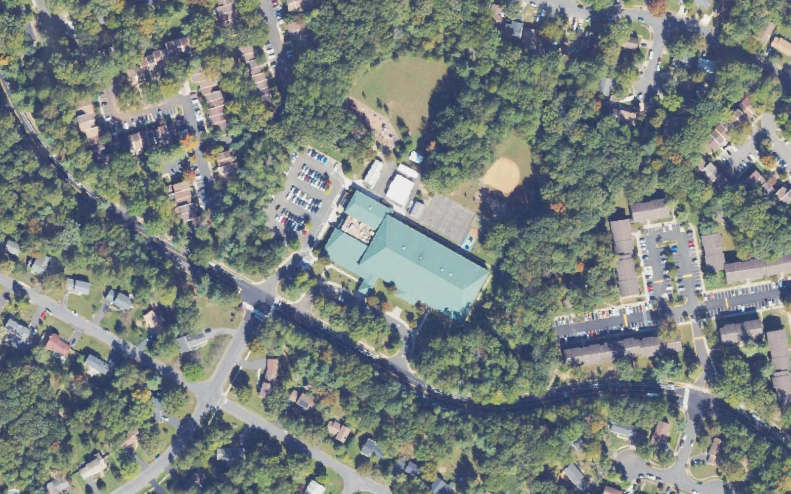 Dogwood Elementary School on Glade Drive in western Reston, with its playing fields and the neighborhoods around it, seen from the air